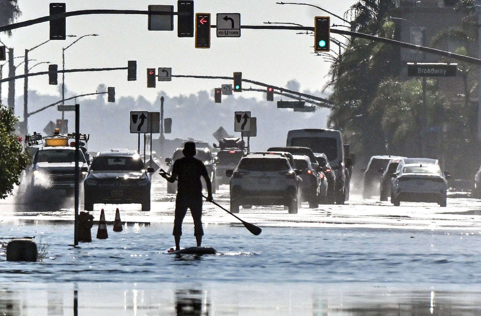 High tides flood parts of Newport Beach and close northbound PCH in Huntington Beach
